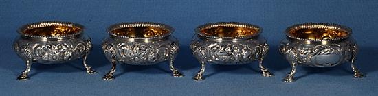 A set of four Victorian embossed silver table salts, by Roberts & Briggs, height 47mm, weight 12.8oz/401grms.